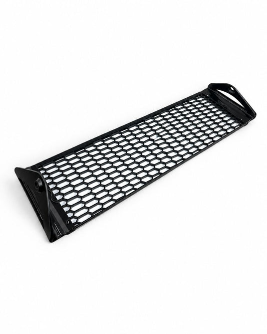 Black honeycomb radiator mesh with end mounting brackets on a white background